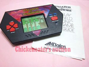 1989 Acclaim Electronic Video LCD Game Watch Wizards Warriors Manual Handheld