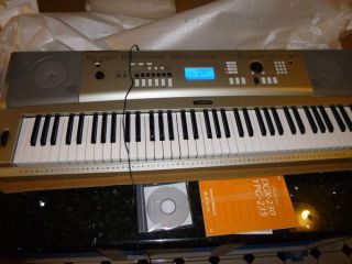 Yamaha YPG 235 76 Key Portable Grand Piano Keyboard with Power Adapter 008679288033