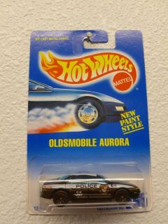 Hot Wheels 265 Oldsmobile Aurora Police K 9 Blk 7 Spoke Blue Tinted Window
